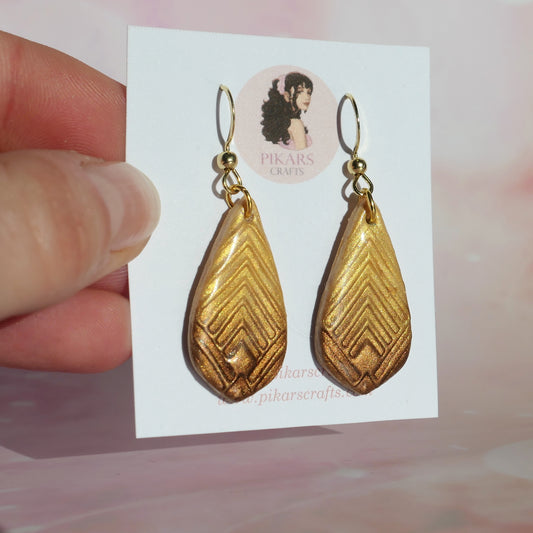 Golden Teardrop Dangles with Shimmer from Polymer Clay